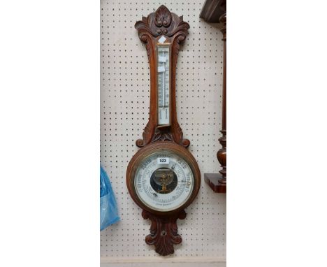 A late Victorian ornate carved wood framed banjo barometer/ thermometer with visible aneroid works to dial centre - thermomet