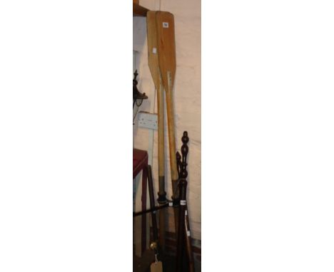 A pair of vintage wooden oars - some old worm damage