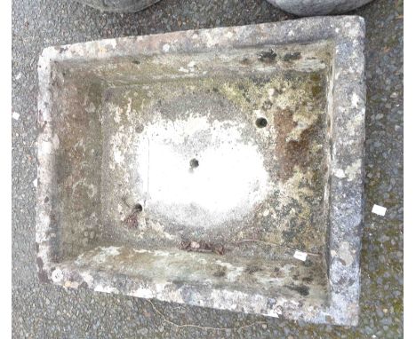 A cast concrete oblong planter - 65cm X 50cm
