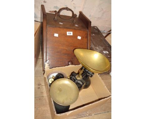 A box containing an old balance scale with an assortment of weights - sold with an oak lift-top coal box with copper handle