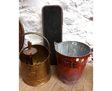 A vintage fire bucket with black lettering on a red ground with a galvanised interior - sold with a brass framed and mesh fol
