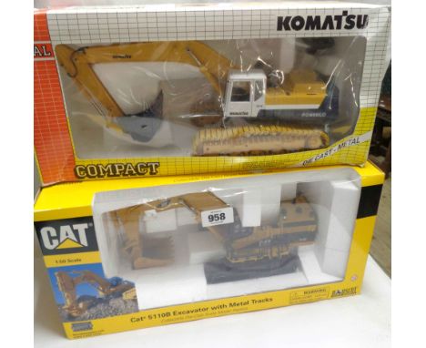 A box Norscot die-cast model of CAT 5110B Excavator - sold with a Joal Komatsu similar