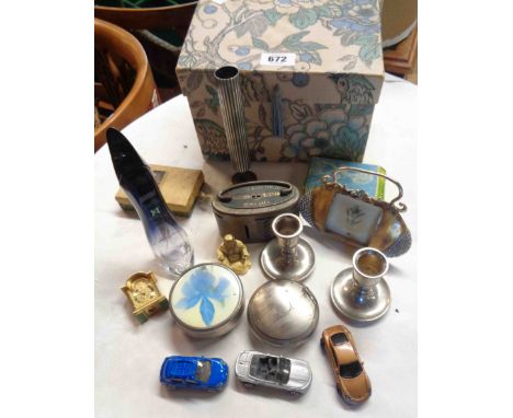 A small box containing a quantity of collectable items including a vintage Barclays Savings bank, playing cards, etc.