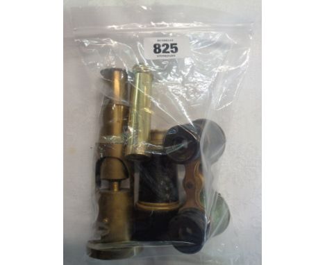 An antique brass portable microscope, a vintage two draw pocket telescope, another similar and a pair of opera glasses -