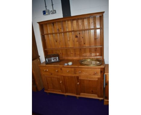 A modern yellow pine dresser base and shelf back of good proportions