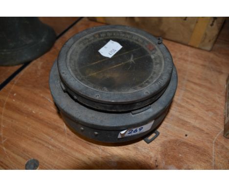 A vintage marine compass.