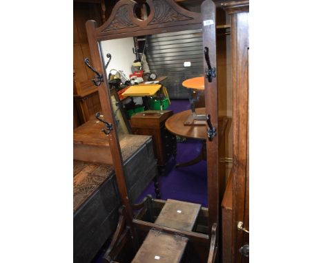 A late Victorian hall way mirror backed coat and stick stand