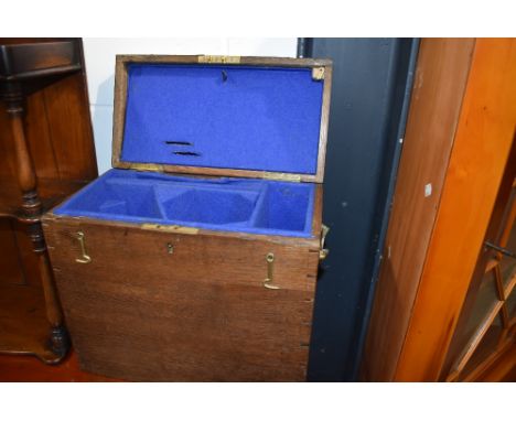 A late Victorian portable decanter or similar case having oak carcass