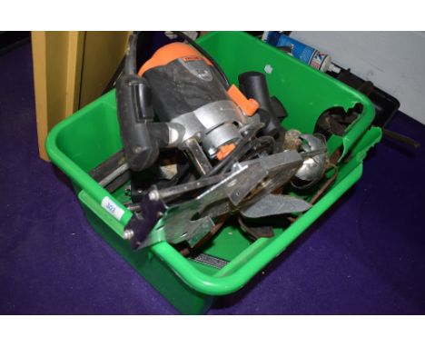 A mixed box of tools including jigsaw.