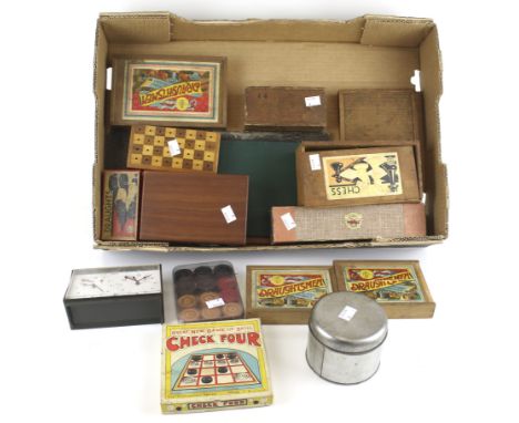 An assortment of vintage games. Including a chess set, draughts set, board games, counters, etc. some in the original boxes
