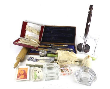 An assortment of vintage kitchen items. Including a Price Bros ceramic honey pot, a table lighter, pair of glass candlesticks