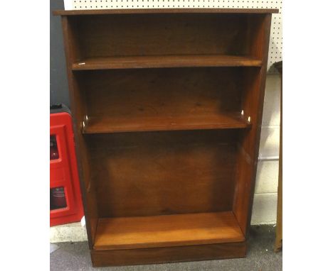 A contemporary wooden bookcase/shelving unit. Containing two adjustable shelves and a single static shelf, H134cm x W94cm x D