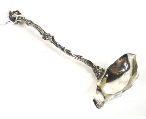A Dutch .930 standard sauce ladle with a double-lipped bowl and a rustic scroll handle with a putti with a floral halo termin