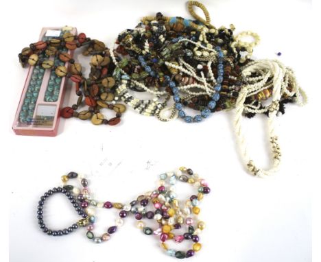 A collection of miscellaneous costume jewellery and other items. Including a black-cultured-freshwater-pearl bracelet; a simi