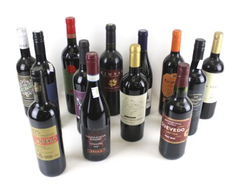 Thirteen bottles of wine. Comprising a bottle of Marcel Bocardo 2020, 75cl, 14%, Las Parcelas Rioja 2015, 75cl, 14%, Puglia R