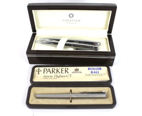 Two boxed pens. Comprising a pair of Scheaffer, 'The syndicate pen' ball point pens. In a wood case; together with a Parker '