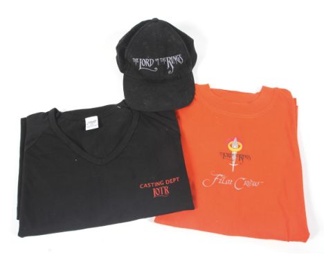 Lord of the Rings - film crew clothing. Including a black t-shirt, baseball cap and a red t-shirt. This item comes from the c