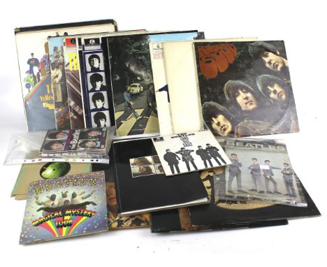 Vinyl, a collection of Beatles singles and LP's and various other related items. The LP's include The White Album No.00637760