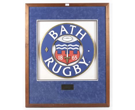 A framed Bath Rugby crest. The crest constructed in a three dimensional manner by 'Classic Crests' and signed 'N R Moore' in 