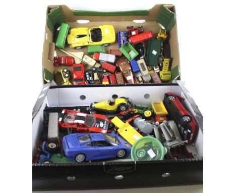 An assortment of playworn diecast vehicles in two boxes. Including Maisto, Bugatti, Matchbox, etc. 