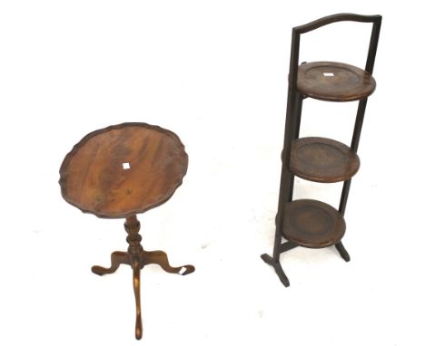 A tripod occasional table and a folding cake stand. The tripod table mounted on a turned central column, H51cm, the cake stan