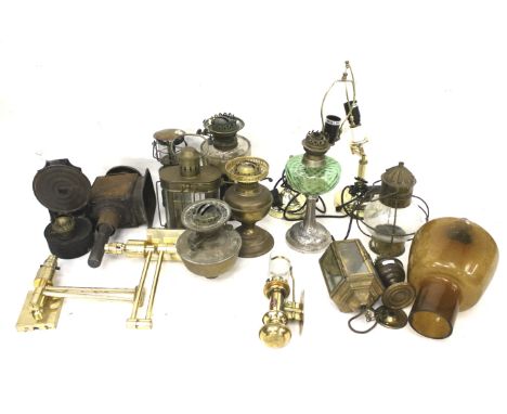 An assortment of Victorian and later lights and oil lamp components. Including reservoirs, stands, shades, etc.