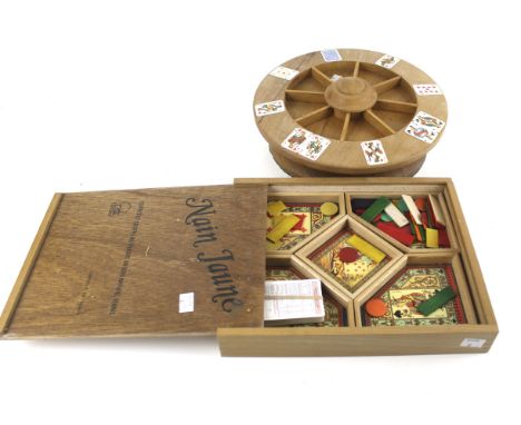 Two vintage card games. Comprising a Nain Jaune set and one other featuring a rotating stand