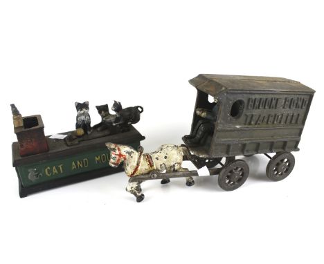 Two vintage cast metal novelty money boxes. Comprising 'Cat and Mouse Bank', H13cm and a horse drawn carriage marked 'Brooke 