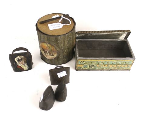 Two vintage biscuit tins and a set of miniature cow bells. Including Macfarlane, Lang & Co. Ltd 'tree stump and axe' plus a M