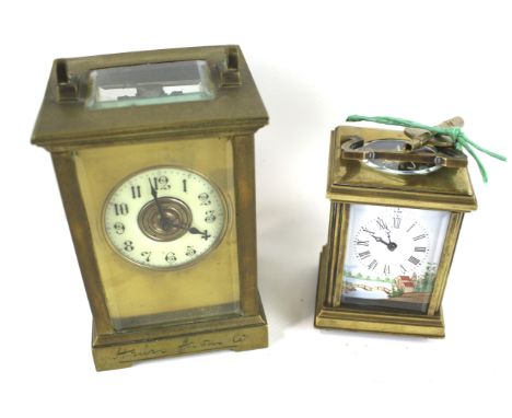 Two brass cased carriage clocks. One with an enamel example with Arabic numerals, the case engraved 'Henri from W', H12cm, th