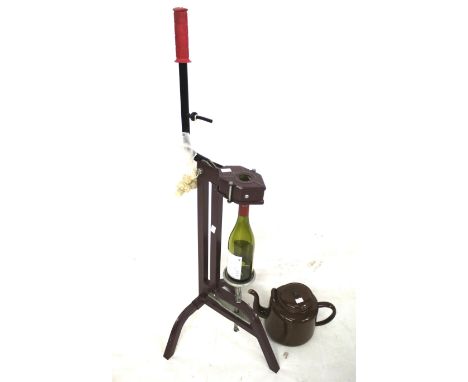 A home wine making brewing bottle corking machine and a GR VI enamel teapot. 