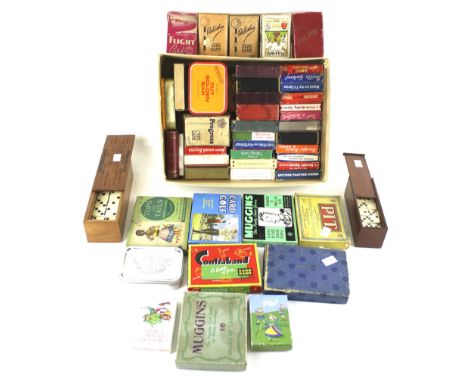 A collection of vintage cards and games. Including 'Card Golf', a cribbage board, set of dominoes, etc. some in the original 