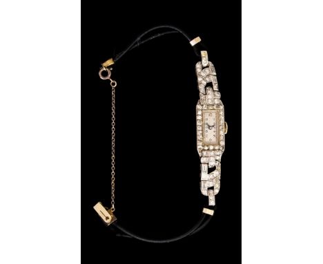 An&nbsp;Early 20th Century&nbsp;Lady's Manual Wind Wristwatch, platinum case and shoulders set with diamonds, approximately 3