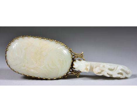 A Chinese Celadon Jade Belt Hook and Ruji Sceptre Panel, the belt hook carved with a salamander and dragon, the ruji sceptre 