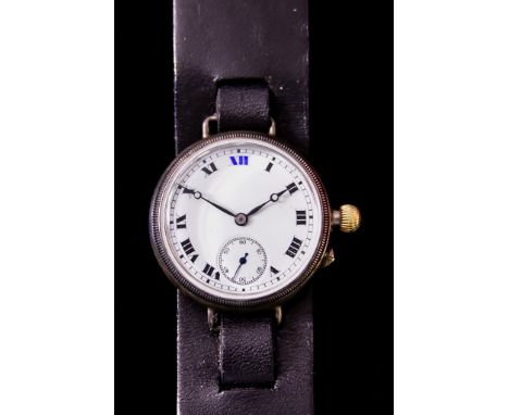 A Gentleman's Manual Wind "Trench Watch", unnamed,&nbsp;35mm diameter silvery metal case, white enamel dial with black Roman 