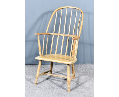 A 19th Century Ash and Beech Stick Back Windsor Armchair, the two-tier back with arched crest rail, wood seat, on turned legs