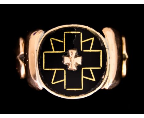 A 9ct Gold Gentleman's Ring, set with onyx, embellished with cross symbols, shanks depicting two hearts, size T, gross weight