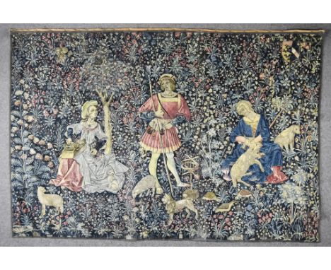 A 20th Century Machine Made Continental Tapestry of 16th Century Design, woven in colours, depicting three standing figures a