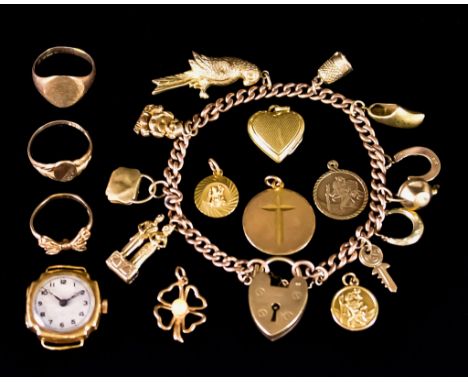 A Quantity of 9ct Gold, comprising - charm bracelet with padlock clasp, suspended with ten charms, a small heart shaped locke