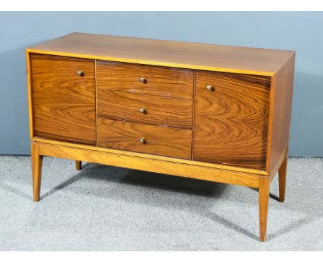 A Mid-20th Century Teak Sideboard, by Uniflex, with square edge to top, fitted three central drawers flanked by cupboards, ea