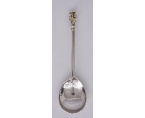 A James I Silver and Parcel Gilt Apostle Spoon with maker's mark of a crescent enclosing a mullet, London 1618, the fig-shape