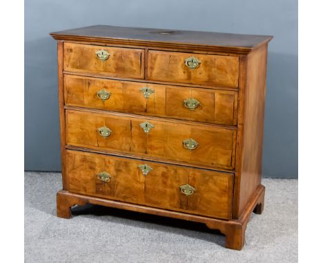 An 18th Century Walnut Chest, with cross banded and moulded edge to top, fitted two short and three long graduated drawers, e