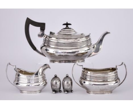 A George V Silver Rectangular Three-Piece Tea Service and a Pair of Victorian Silver Salts, the tea service by Z. Barraclough