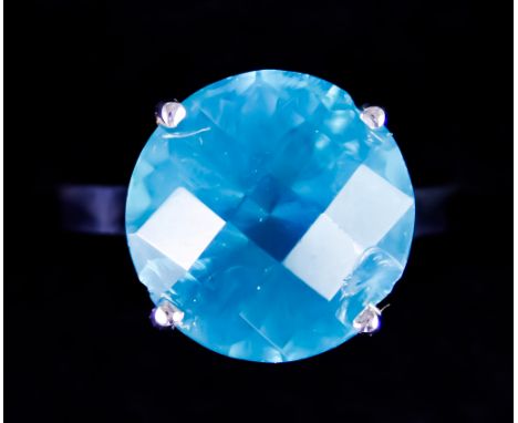An 18ct White Gold Faceted Gem Set Ring, set with a neon blue apatite, approximately 16ct, size U, gross weight 11.9g, with c