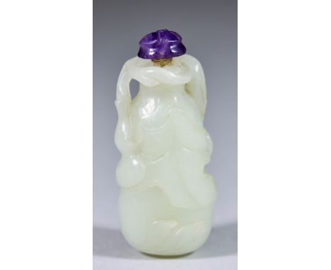 A Chinese White Jade Snuff Bottle, 18th Century, carved as a gourd with smaller gourds and leaves, 2.5ins (6.4cm) with stoppe