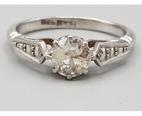 Antique platinum and 0.70ct old cut diamond solitaire ring. Size M 3.2g