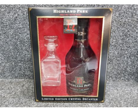 Limited edition box set containing a bottle of Highland park single malt scotch whisky with limited edition crystal decanter,