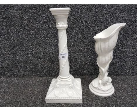 Royal Worcester candlestick no 1050, and a conch shell shaped vase by the same maker no 2351 (damaged)