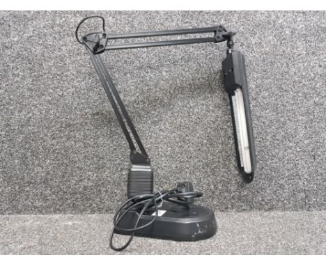 A black modeling anglepoise lamp with weighted base by Hansa, in working order.