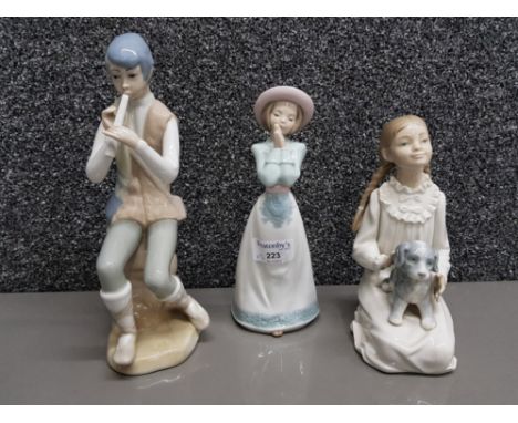 Two Nao by Lladro figures of girls one numbered 1224, and a Casades figure